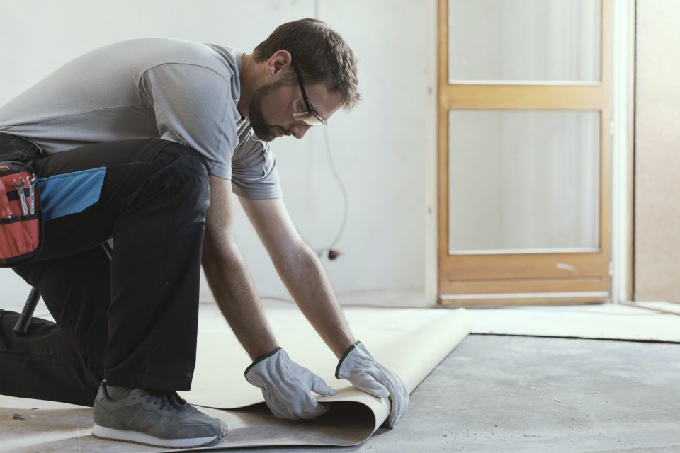 contractor-removing-an-old-linoleum-flooring-1.jpg